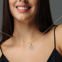Thumbnail for Happiness Initial Necklace displayed on a woman, personalized gold jewelry by Brother & Sisters with letter S.