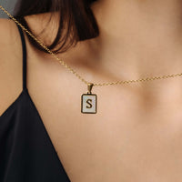 Thumbnail for Happiness Initial Necklace featuring an elegant 'S' pendant on a gold chain by Brother & Sisters.