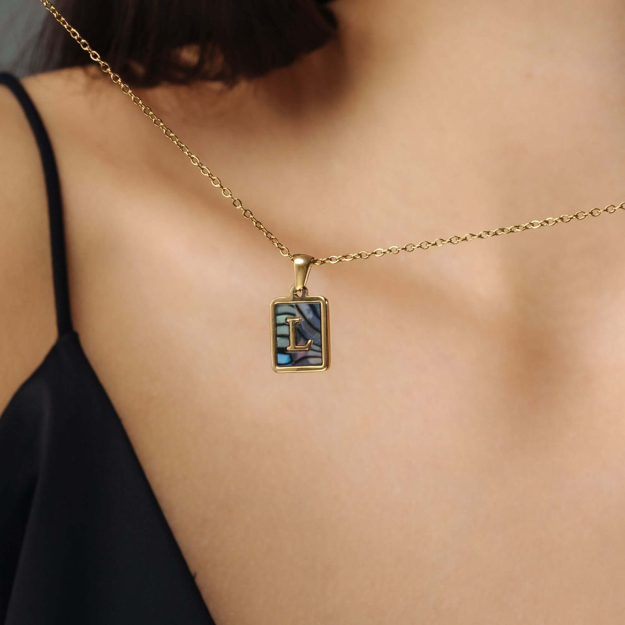 Happiness Initial Necklace - Gold necklace with 'L' pendant, designed by Brother & Sisters, personalized for women.
