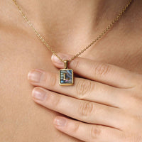 Thumbnail for Happiness Initial Necklace featuring a gold pendant with the letter L, crafted by Brother & Sisters for women.