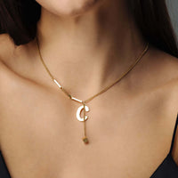 Thumbnail for Simple Initial Necklace by Brother & Sisters featuring a delicate gold design with a personalized initial charm.