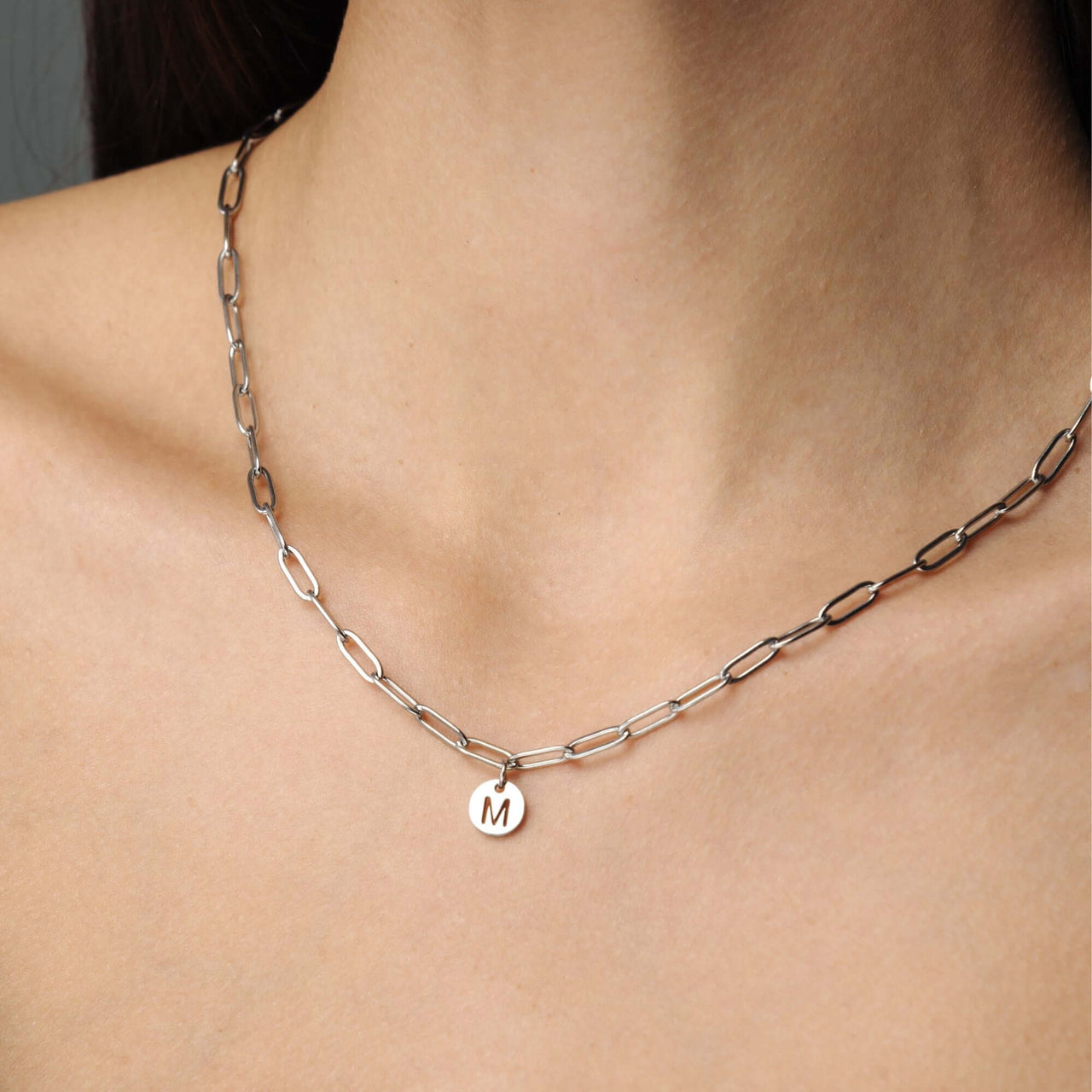 Trendy Initial Necklace featuring a silver chain and personalized M pendant by Brother & Sisters.