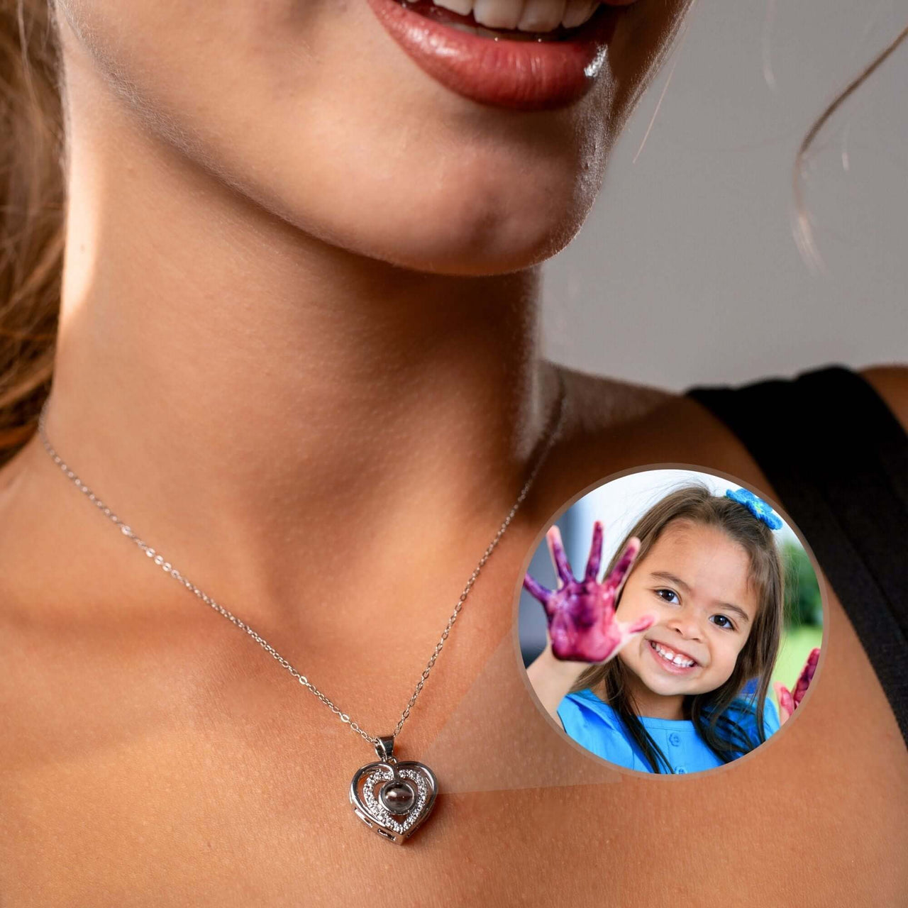 Hearts Photo Necklace by Brother & Sisters worn by a woman, showcasing a heart-shaped locket with a personal photo.