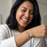 Thumbnail for Lane B v2 Knot Couple Bracelet silver solo joy lifestyle Mexican woman authentic candid laugh
