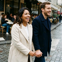 Thumbnail for Mexican-French couple laughing in Parisian street wearing gold Heart Bond bracelets