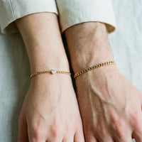 Thumbnail for Heart Bond Matching Bracelet Set — gold couple wrists on linen, dainty Her + slim His