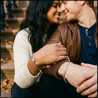Thumbnail for Couple wearing Heart Bond bracelets brownstone autumn