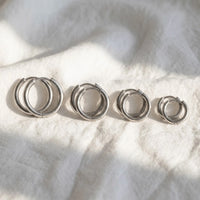 Thumbnail for Huggie Hoop Earrings Set of 4 Pairs in Silver, macro detail of the metal and the finish | SKU: huggie-set-silver