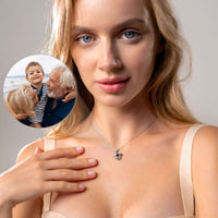 Thumbnail for Elegant woman wearing the Infinite Photo Necklace by Brother & Sisters, showcasing a cherished family photo.