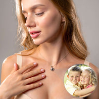 Thumbnail for Model wearing the Infinite Photo Necklace by Brother & Sisters, showcasing a personalized photo projection.