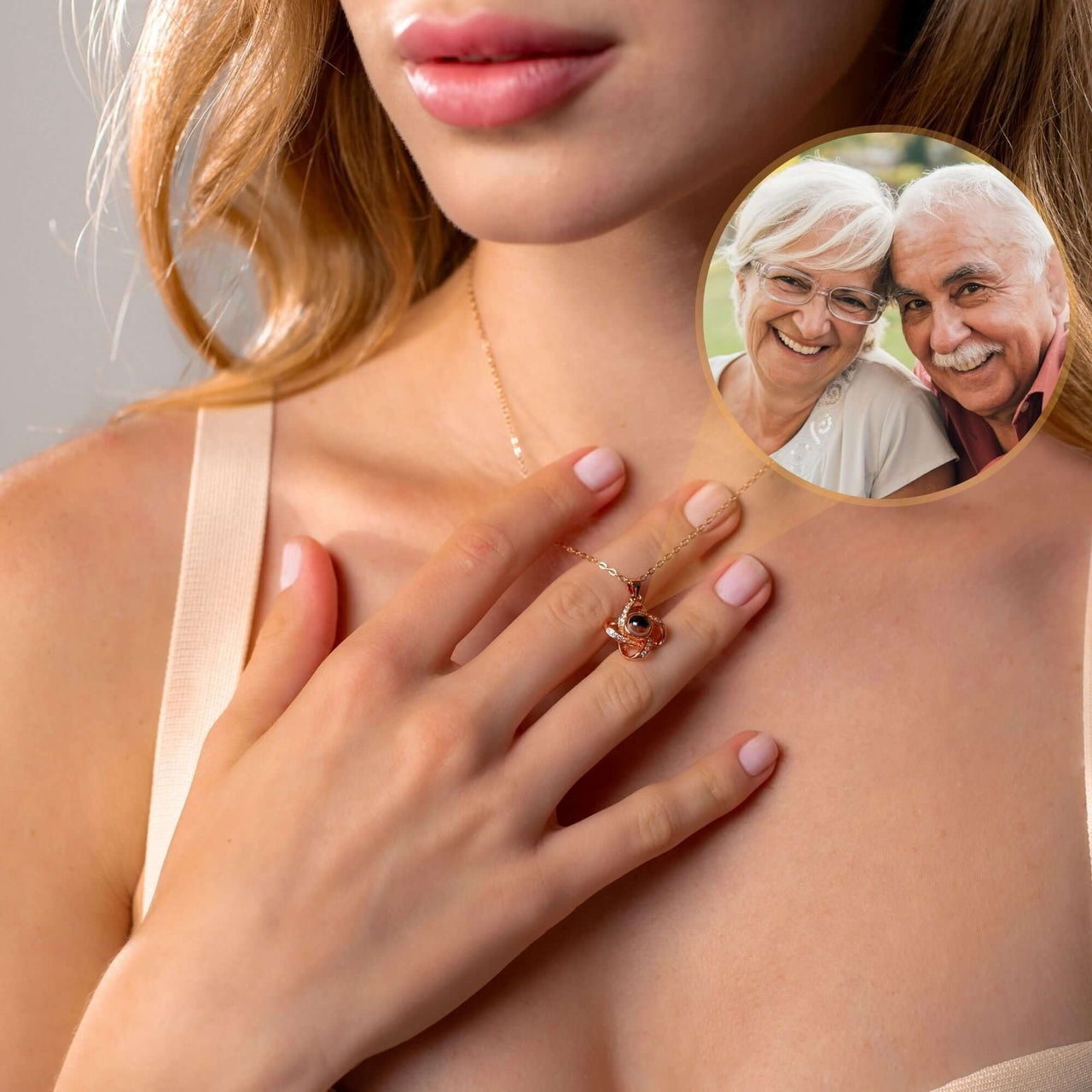Woman wearing Infinite Photo Necklace by Brother & Sisters, featuring a cherished photo projection of loved ones.
