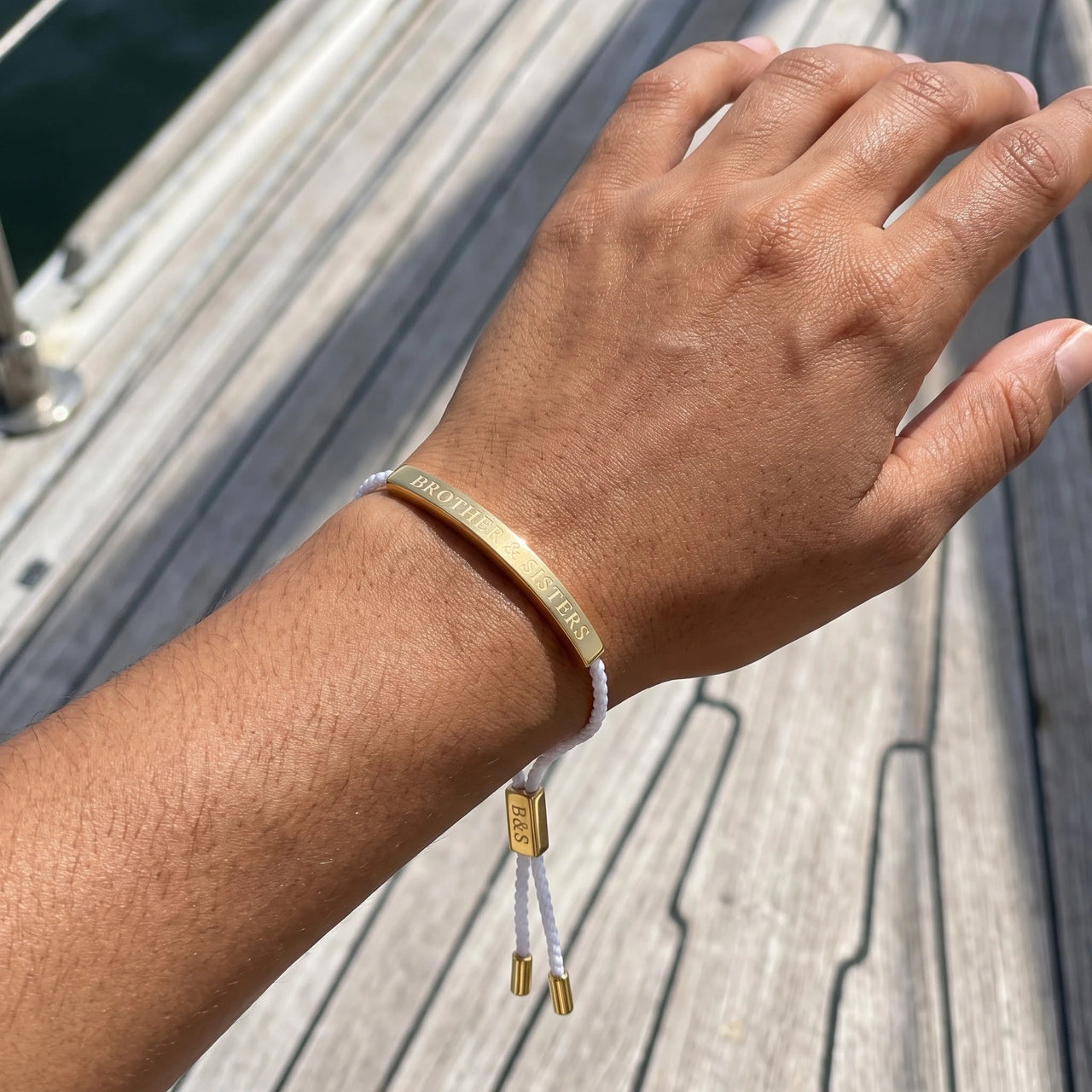 Gevlochten armband — gedragen, echte grootte, goud | SKU: laperle-g