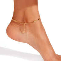 Thumbnail for Layla gold anklet profile view on bare ankle — flat snake chain with adjustable paperclip extension visible