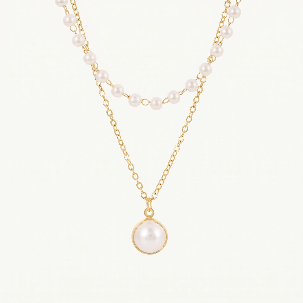 Parelketting — productfoto op witte achtergrond, goud | SKU: lepure