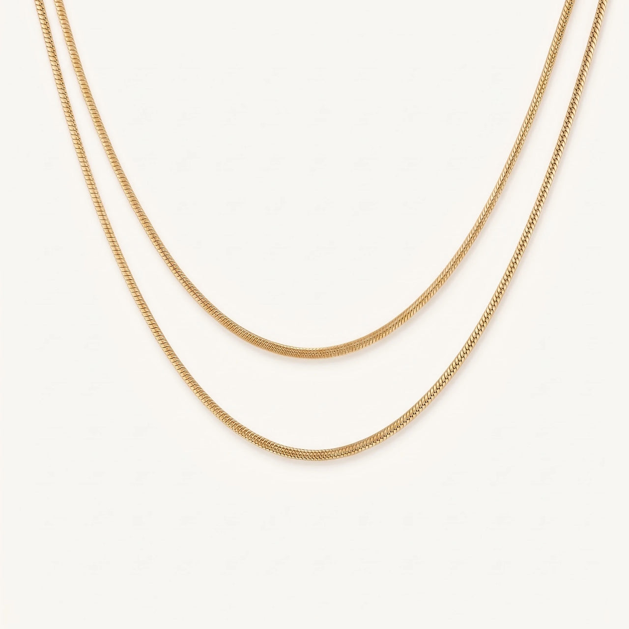 Slangenketting — productfoto op witte achtergrond, goud | SKU: lesimplenecklace