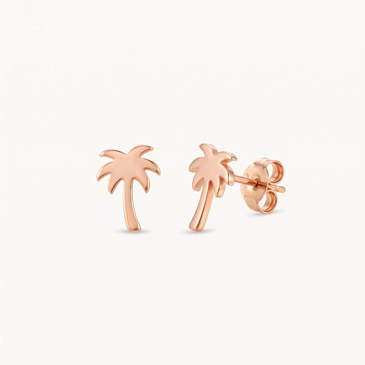 Palmboom oorbellen — productfoto op witte achtergrond, rosé goud | SKU: 10287609-rose-gold-color