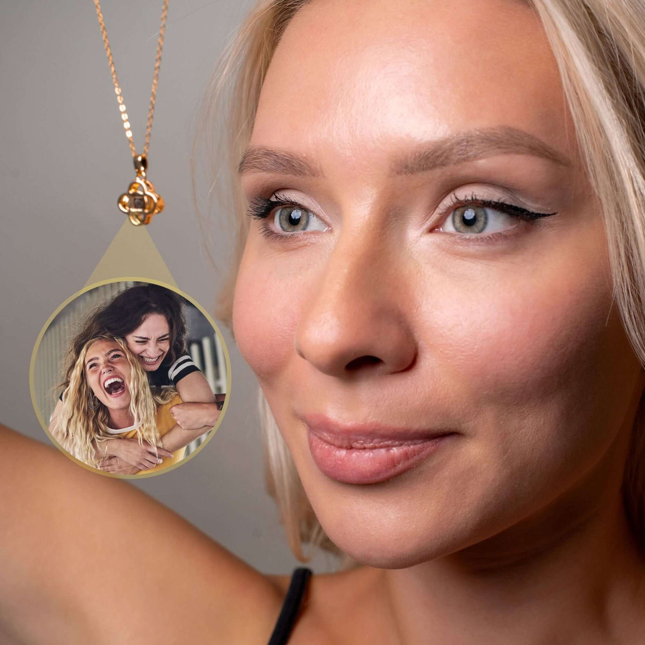 Luxurious Photo Necklace worn by a woman, showcasing a cherished photo with friends in a stylish design by Brother & Sisters.