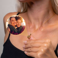 Thumbnail for Beautiful woman showcasing Luxurious Photo Necklace with cherished photo, designed by Brother & Sisters.