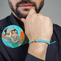 Thumbnail for Man Blue Photo Bracelet showcasing a personalized photo of fun swimming memories by Brother & Sisters.