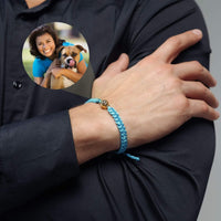 Thumbnail for Man Blue Photo Bracelet showcasing a personalized photo of a woman and her dog on a stylish blue cord bracelet by Brother & Sisters.