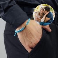 Thumbnail for Man Blue Photo Bracelet featuring a blue braided design and a photo of a happy couple, perfect gift from Brother & Sisters.