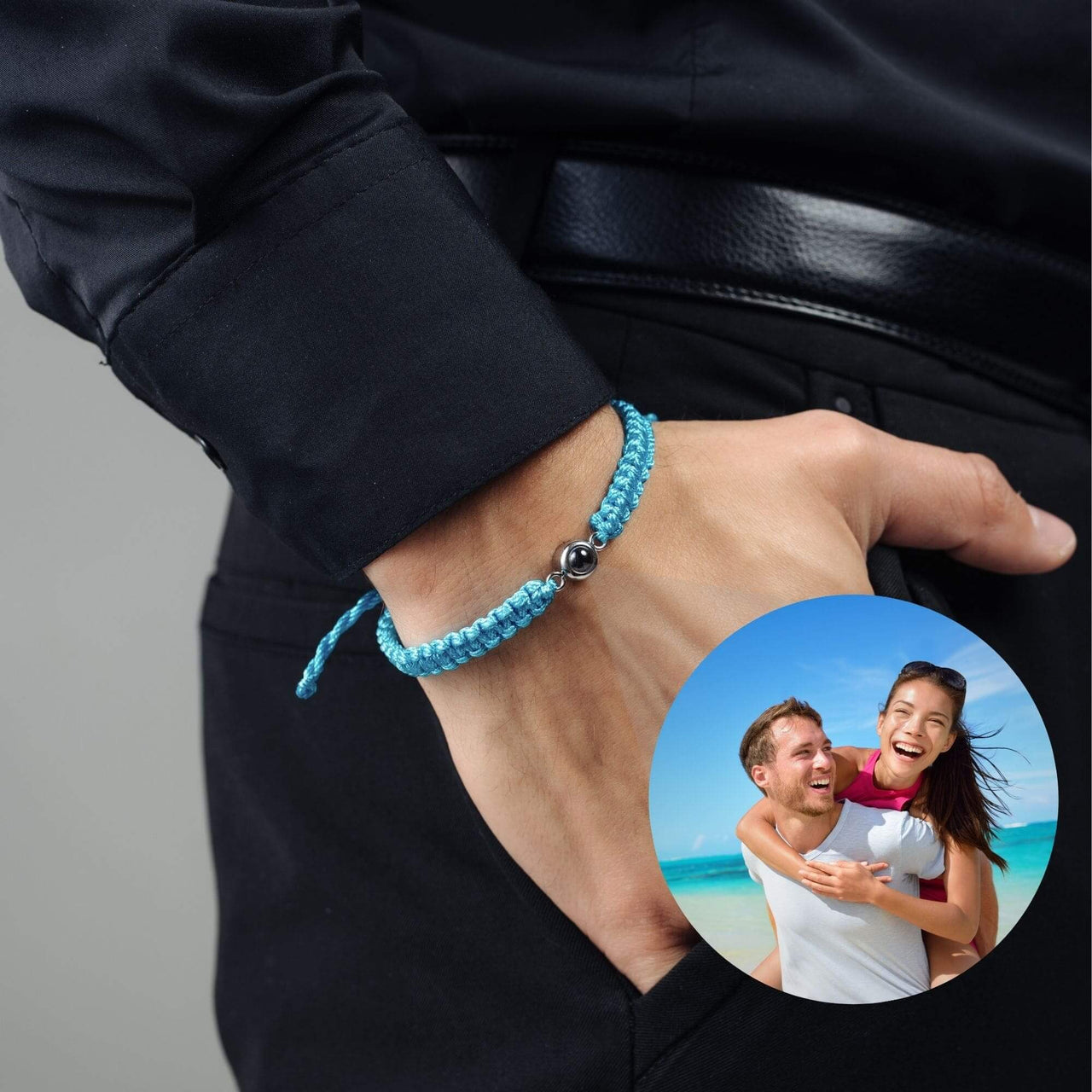Man Blue Photo Bracelet on wrist with photo pendant, featuring a couple enjoying a beach day, by Brother & Sisters.