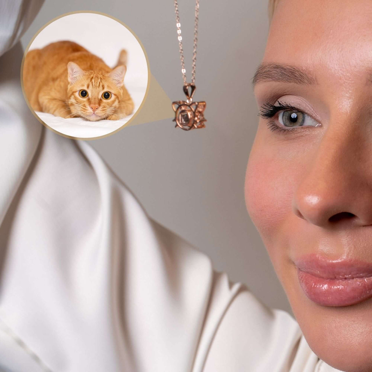 Woman wearing a Meow Photo Necklace with a projection of her orange cat, featuring Brother & Sisters brand.