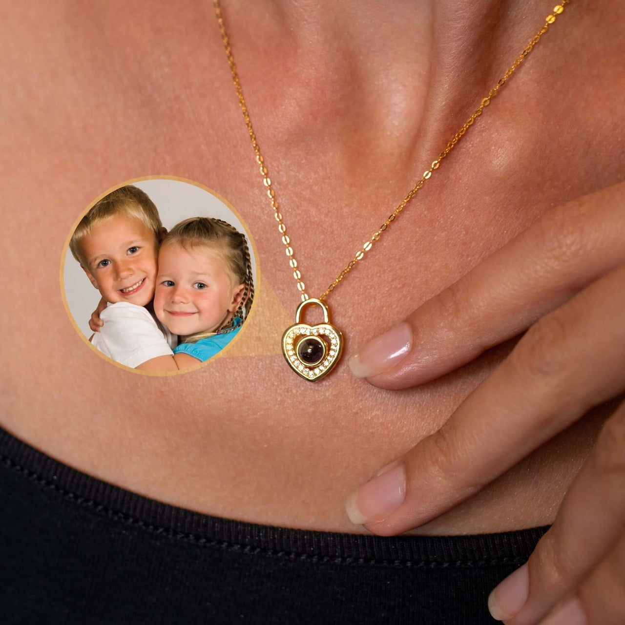 Padlock Photo Necklace featuring a heart-shaped locket and a picture of loved ones, by Brother & Sisters.