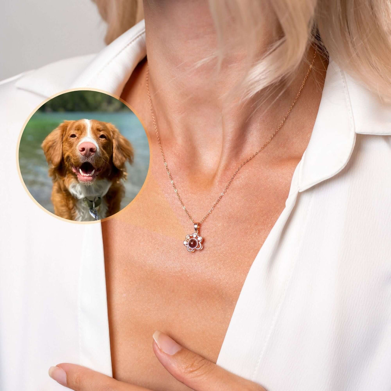 Paw Print Photo Necklace featuring a hidden photo projection of a happy dog, by Brother & Sisters.