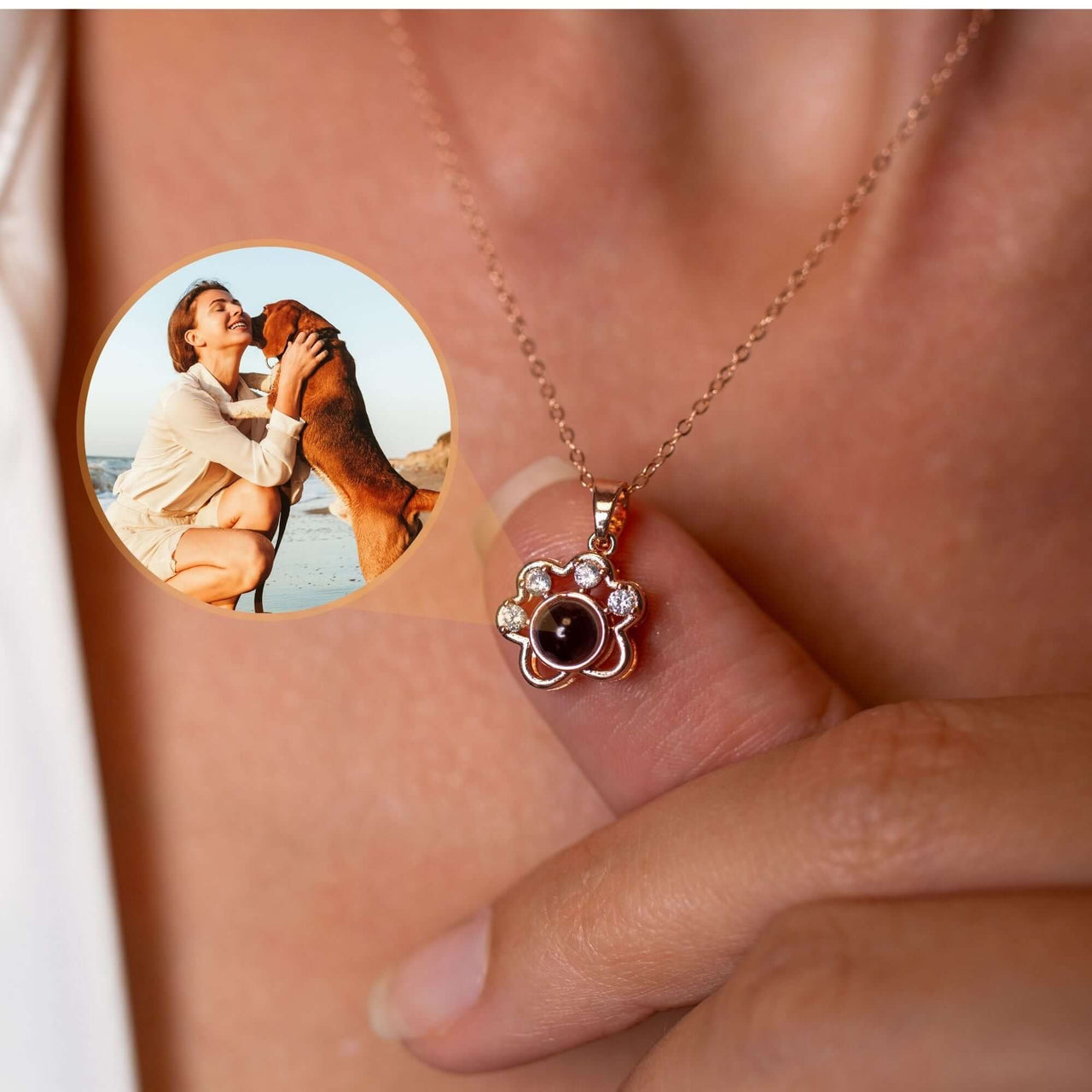 Paw Print Photo Necklace by Brother & Sisters, showcasing a sentimental paw print pendant with a photo projection.