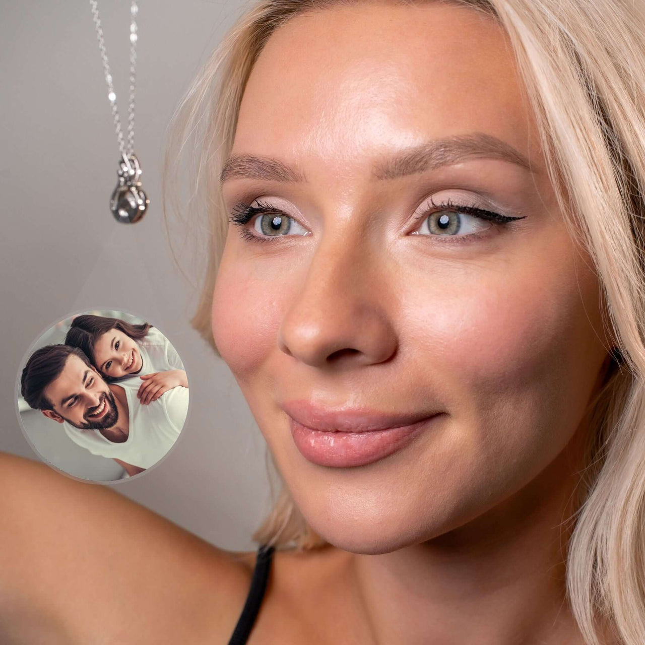 Phoenix Photo Necklace worn by a woman, showcasing a personal photo charm from Brother & Sisters.