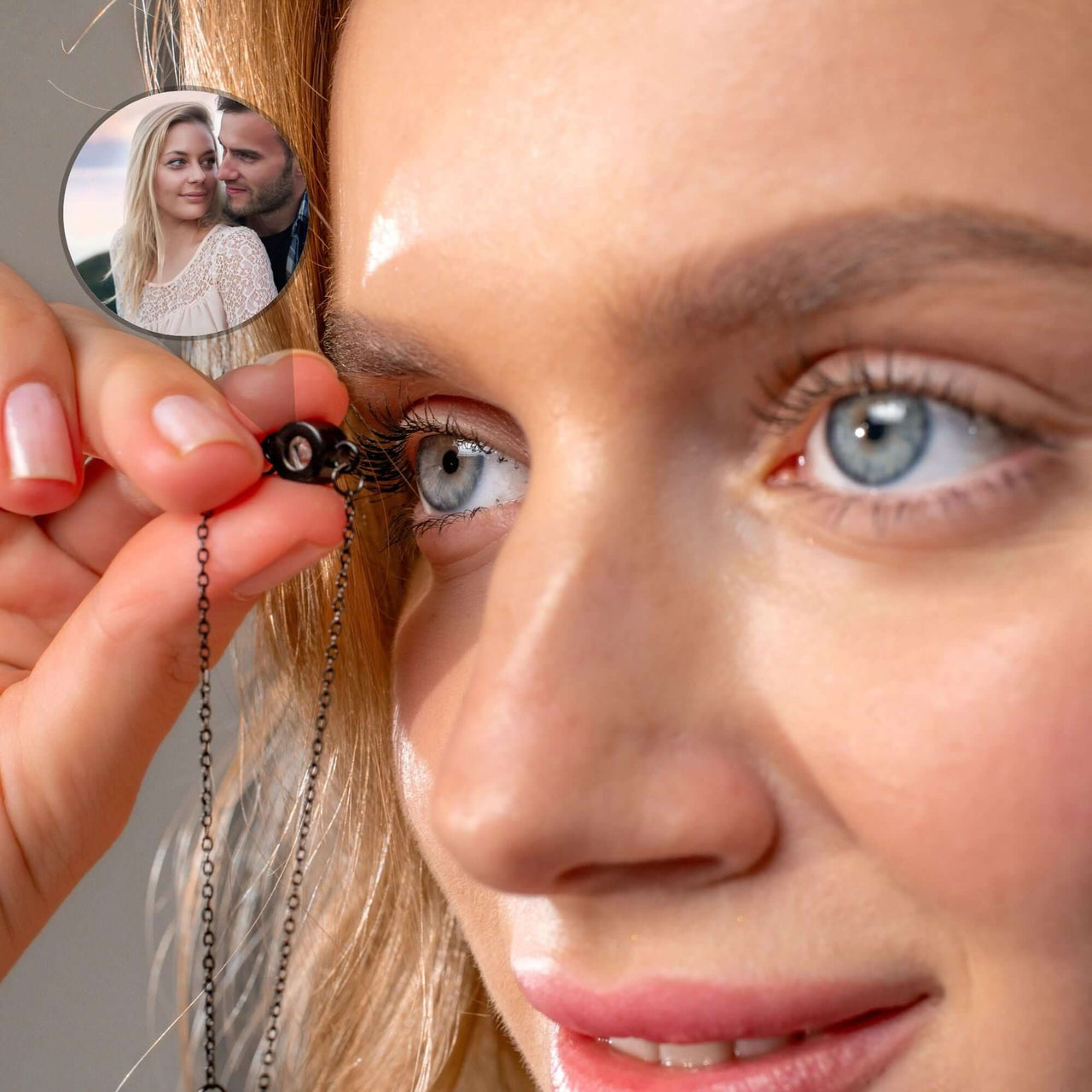 Close-up of woman holding Photo Personalized Bracelet with photo projection of a couple, by Brother & Sisters.
