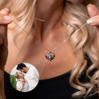 Thumbnail for Precious Heart Photo Necklace by Brother & Sisters held by a woman, featuring customizable heart-shaped photo insert.