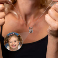 Thumbnail for Reindeer Photo Necklace featuring a charming pendant and a personalized photo insert, designed by Brother & Sisters.