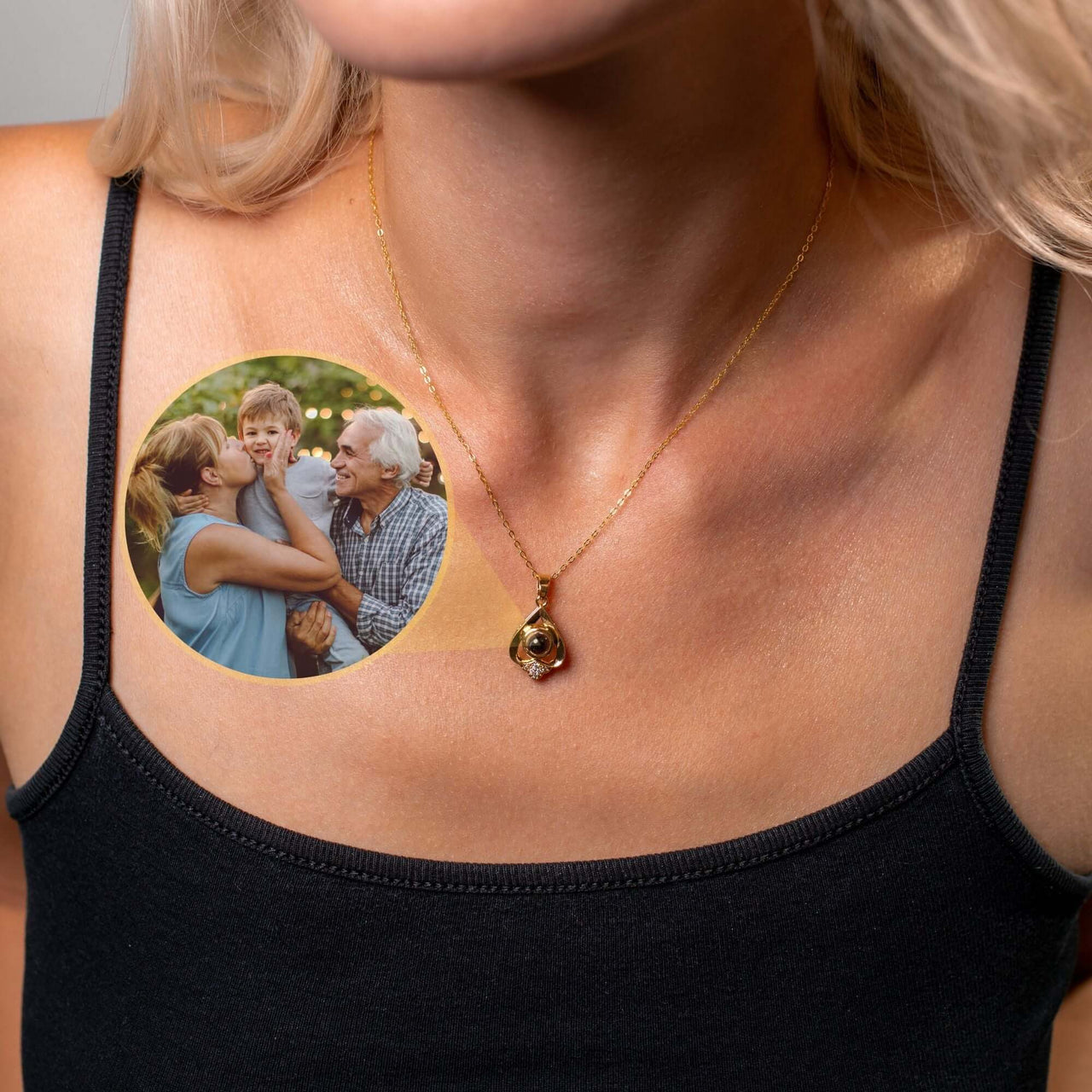 Reversed Heart Photo Necklace worn by a model, showcasing customized pendant with a family photo visible.