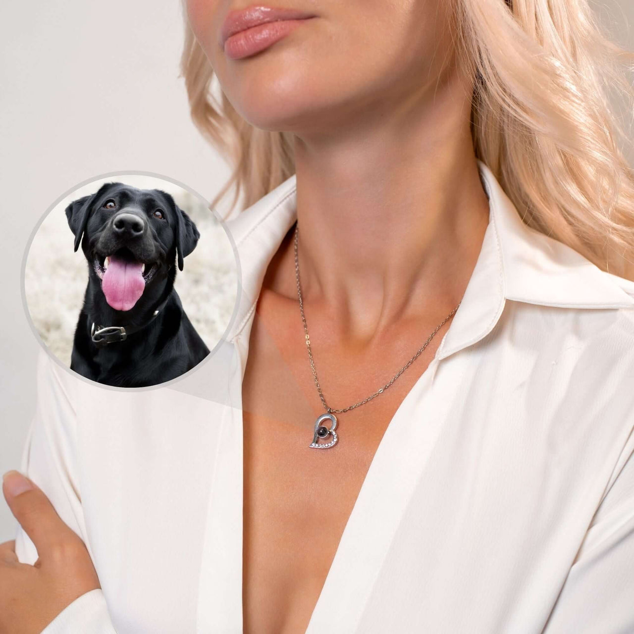 Romantic Photo Necklace with personalized dog photo projection by Brother & Sisters, worn by a model.