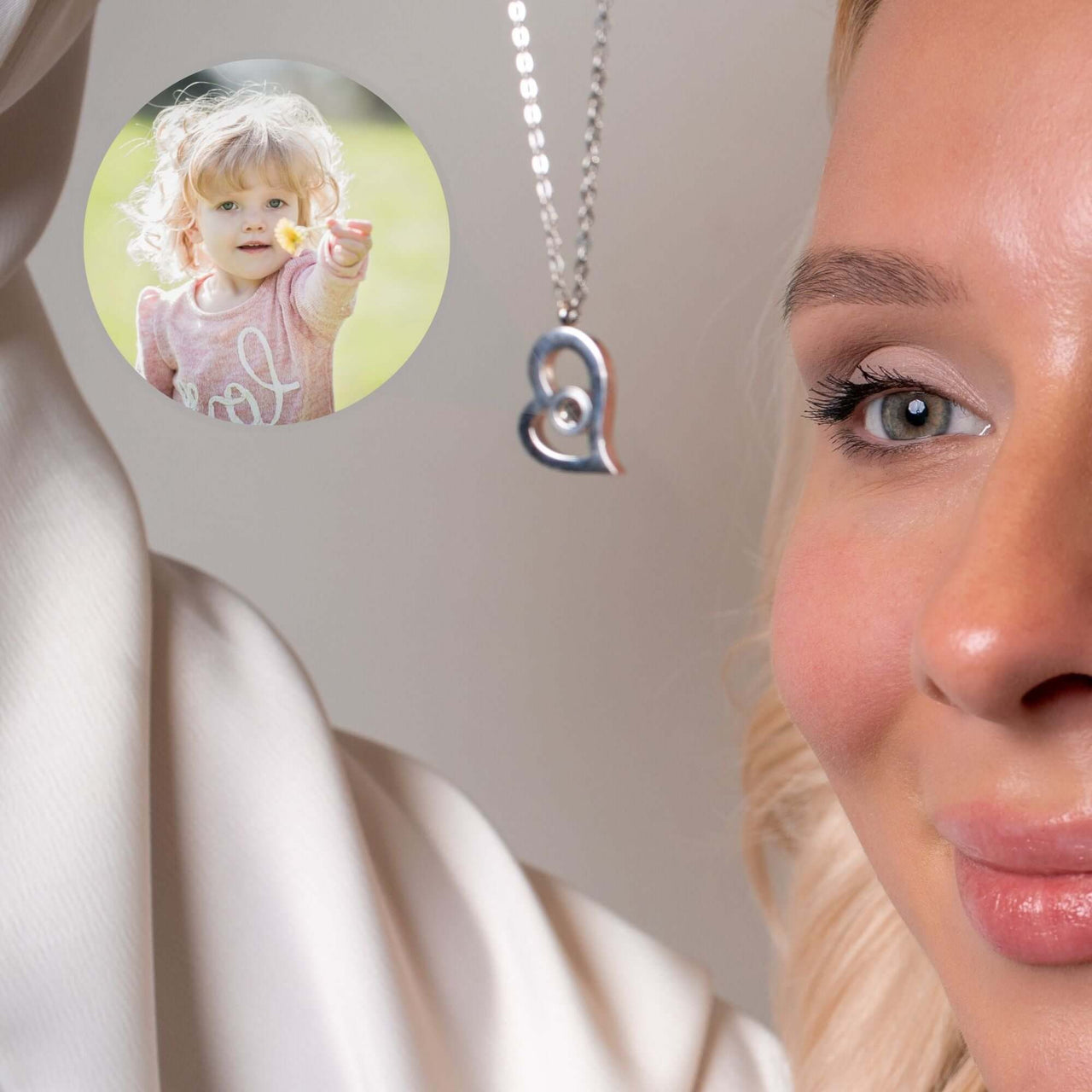 Romantic Photo Necklace by Brother & Sisters showcasing a heart pendant with a hidden photo of a child.