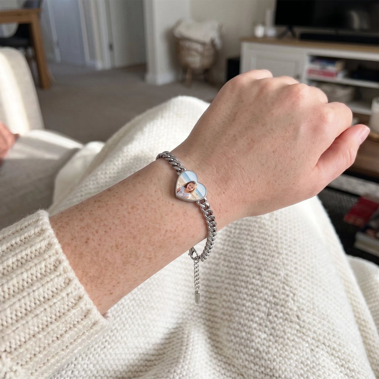 The silver heart photo bracelet on the wrist, showing the lobster clasp and extension chain | SKU: TPH-HRTB-SILVER