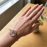 Thumbnail for The rose gold octagon photo bracelet on her wrist, showing its real small size | SKU: TPH-OCTB-ROSEGOLD-18
