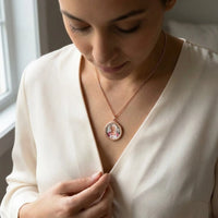 Thumbnail for Woman wearing the rose gold round photo necklace with her grandmother's photo | SKU: TPH-RNDN-ROSEGOLD