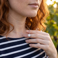 Thumbnail for Woman gently touching her silver necklace | SKU: 33136351
