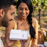 Thumbnail for He surprises her with the silver necklace in its gift box | SKU: 505762