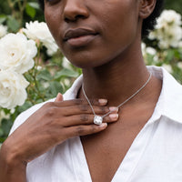 Thumbnail for Woman gently touching her silver necklace | SKU: 505721