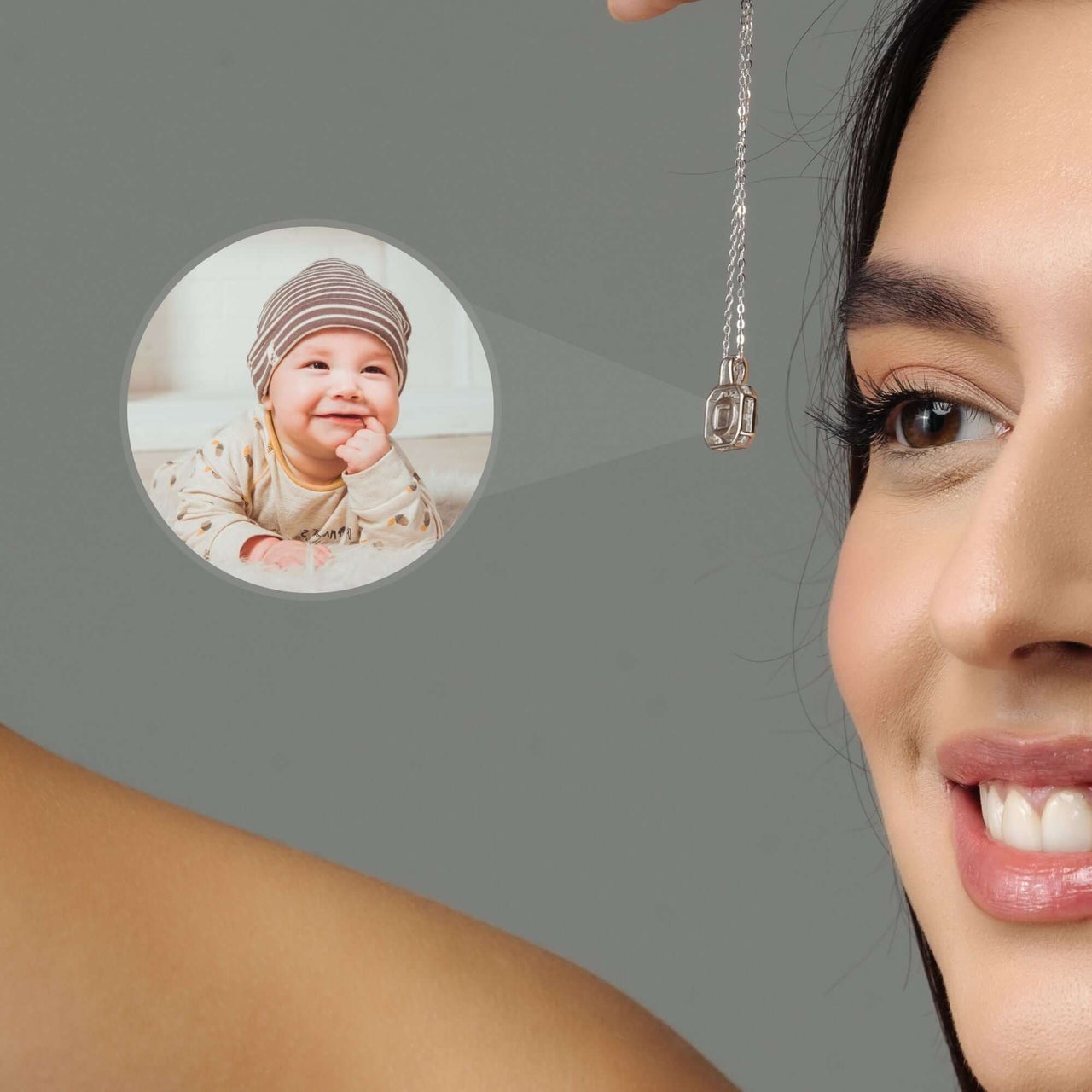 Close-up of a woman smiling, wearing a Square Photo Necklace featuring a cherished child’s photo by Brother & Sisters.