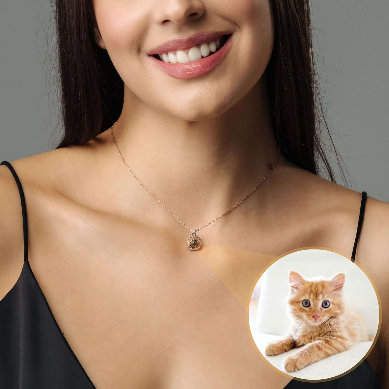 Square Photo Necklace worn by a woman, featuring a small image of an orange cat, from Brother & Sisters.