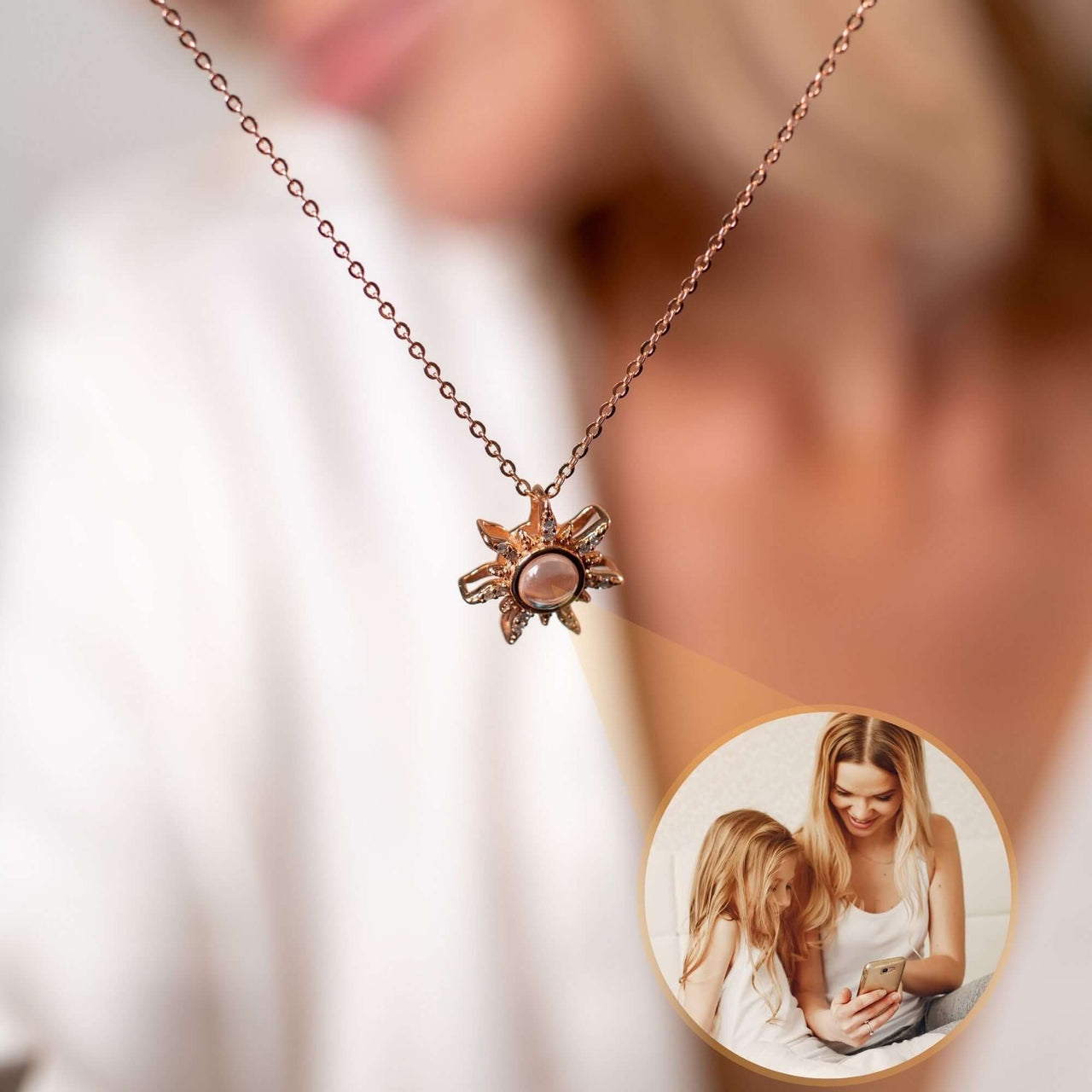 Sun Photo Necklace by Brother & Sisters features a customizable charm with a photo viewable in light.