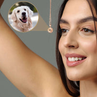Thumbnail for Woman wearing a Sunflower Photo Necklace featuring a golden retriever photo inside the pendant by Brother & Sisters.