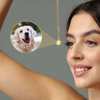 Thumbnail for Sunflower Photo Necklace showcasing a smiling golden retriever inside the pendant, worn by a woman holding it up.