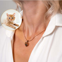 Thumbnail for Woman wearing Timeless Photo Necklace featuring a heart-shaped locket with a photo of a cute cat, by Brother & Sisters.