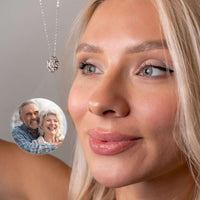 Thumbnail for Triangle Photo Necklace worn by a woman, showcasing a happy couple's photo inside the pendant by Brother & Sisters.